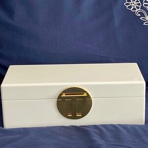Striking C WONDER ewelry Case in White with Gold T on Front.